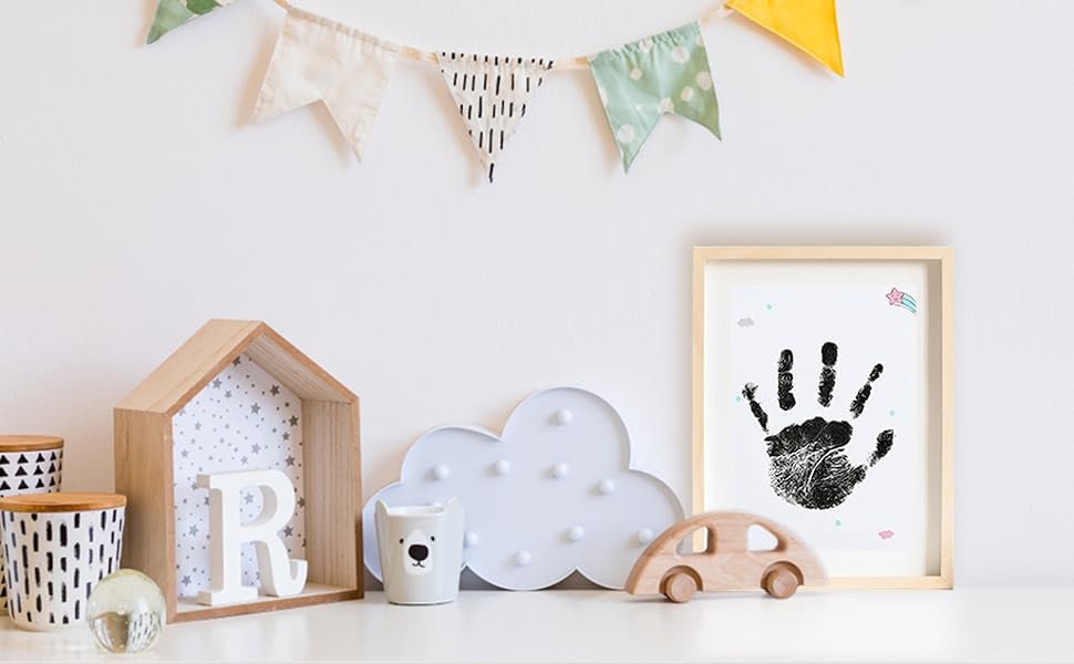 ADOV Baby Handprint and Footprint Kit with Safe Touch Inkless Pad for creating cherished keepsakes of babies and pets.