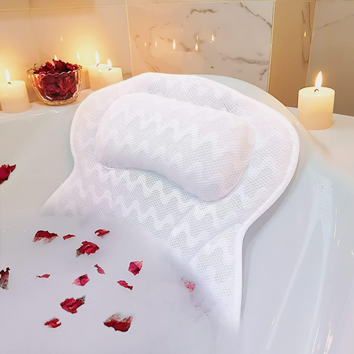 A luxurious bathtub filled with rose petals and surrounded by flickering candles.