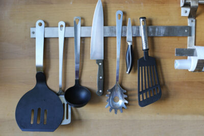 Kitchen appliances on a magnetic strip close up